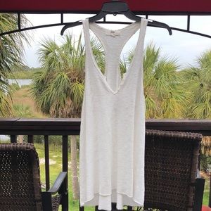 Woman’s top, off white, sleeveless, razor back